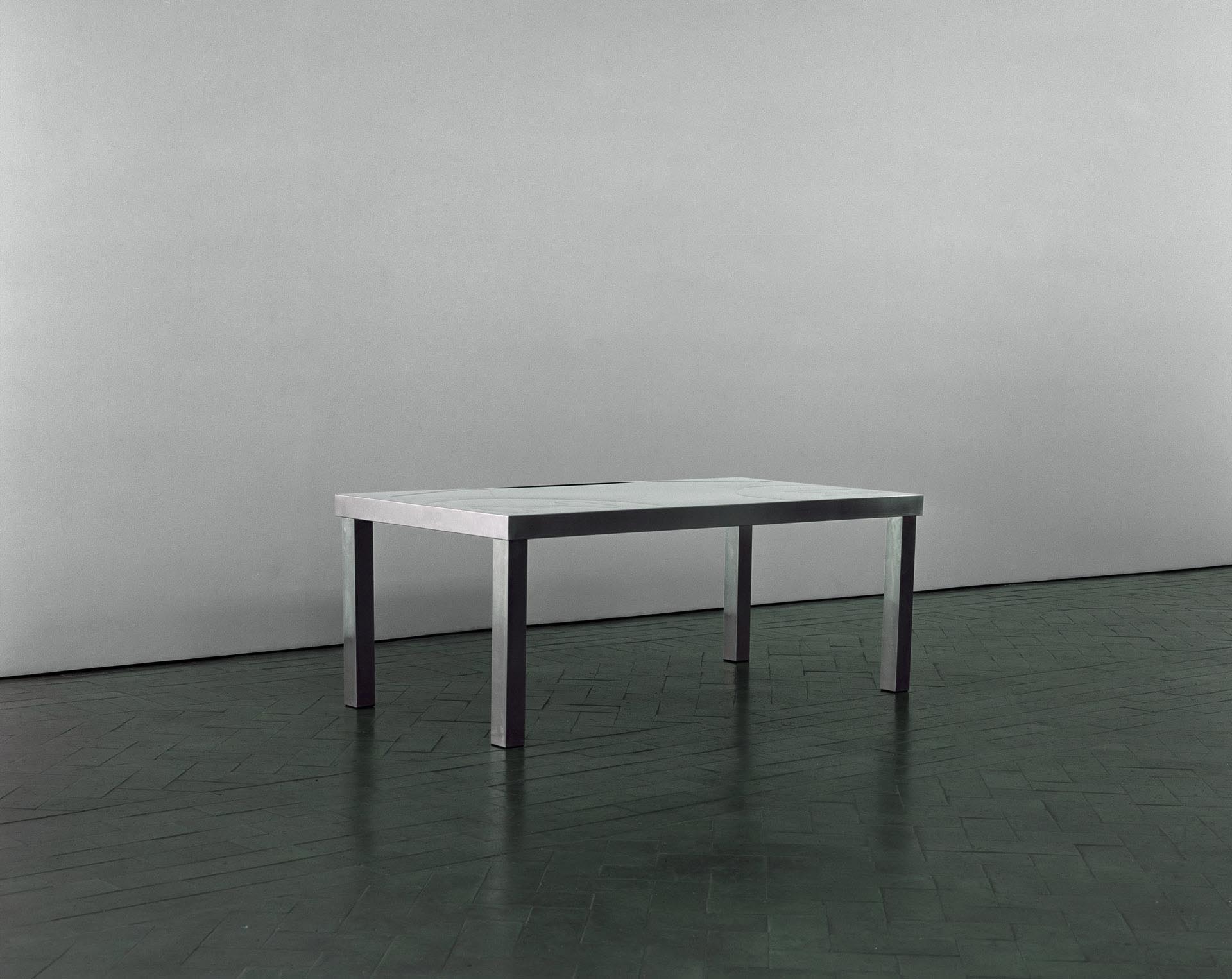 scanned photograph of inohx workstation against wall