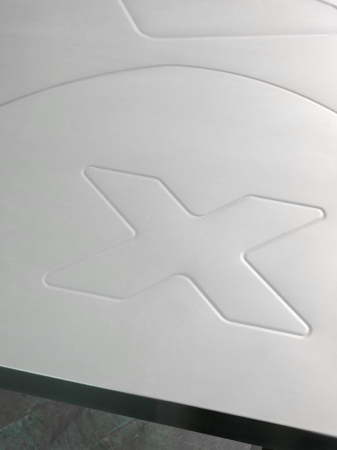 detail of engraved surface on inohx workstation